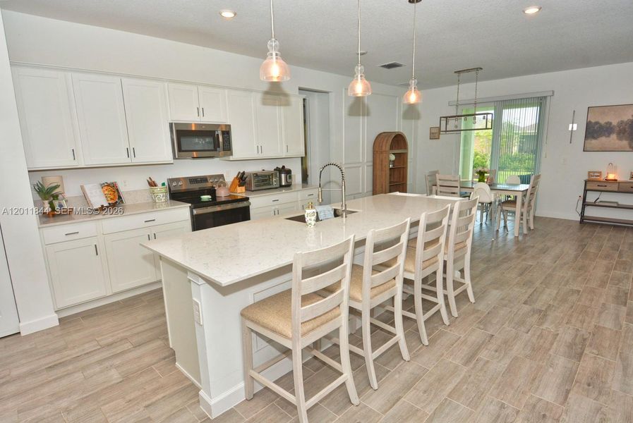 Furnished interior view inside a new home in Central Park, Port St. Lucie (Image 12).