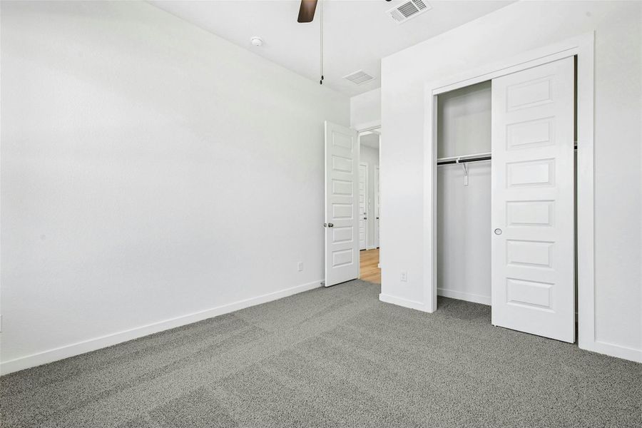 Spacious, unfurnished interior of a new home in The Colony, Bastrop (Image 21). Spacious, unfurnished interior of a new home in The Colony, Bastrop (Image 21).