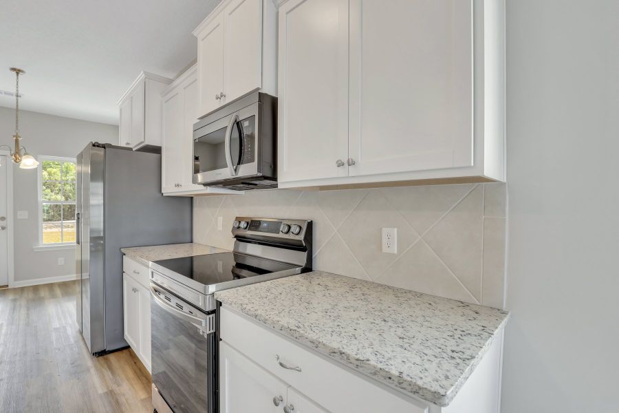 Representative furnished interior of a home built from the The Basswood by RTS Homes in Grand Reserve, Hinesville (Image 8). Representative furnished interior of a home built from the The Basswood by RTS Homes in Grand Reserve, Hinesville (Image 8).