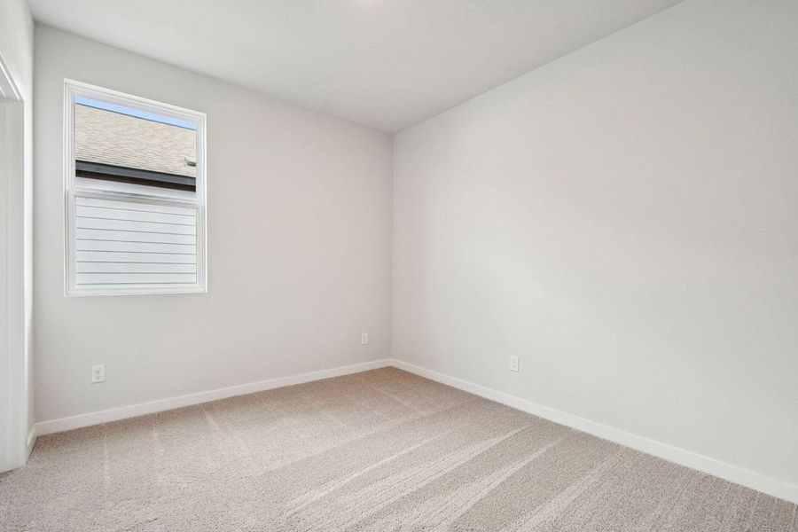 Spacious, unfurnished interior of a new home in Stallion Run, Buda (Image 25).