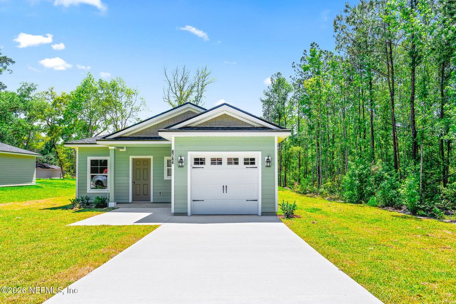 Front exterior of a new home in , Jacksonville, FL, highlighting curb appeal (Image 23).