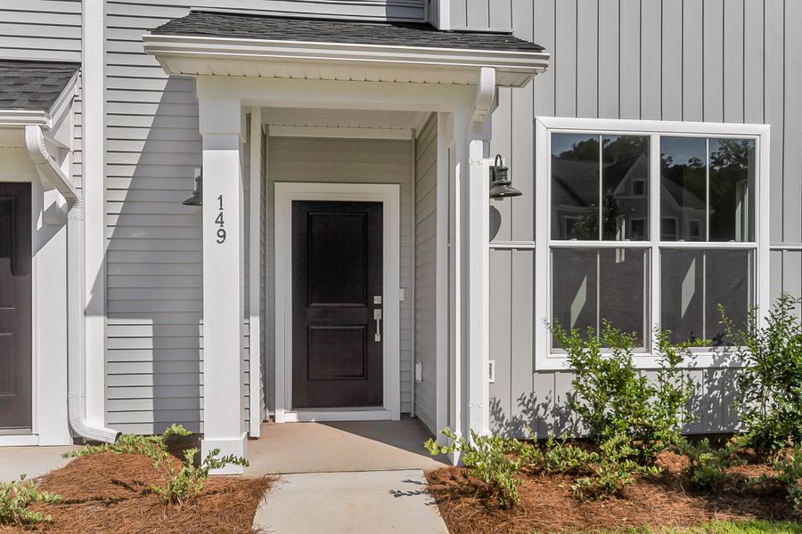 Exterior details and patio area of a home in Six Oaks, Summerville (Image 3).