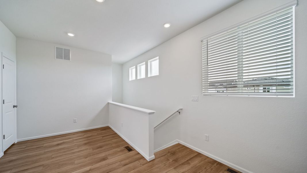 Spacious, unfurnished interior of a new home in Reunion, Commerce City (Image 12).