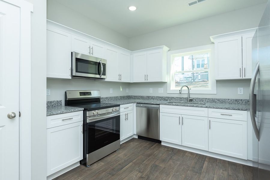 Representative furnished interior of a home built from the Marshall by Foundation Home Builders LLC in Pinnix Loop, Burlington (Image 6).