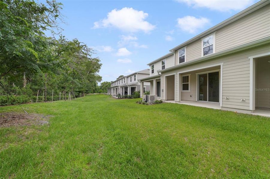 Exterior details and patio area of a home in Towns at Greenleaf, Oviedo (Image 3).