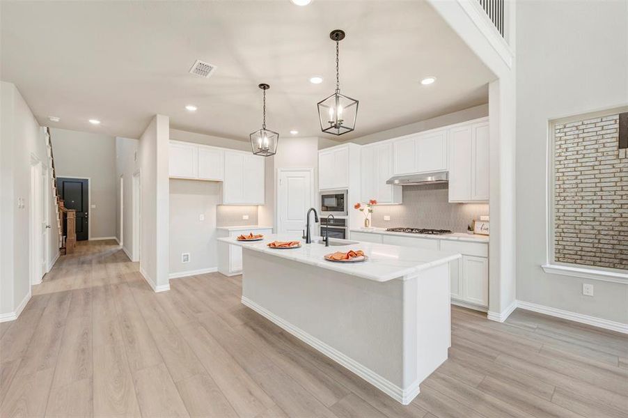 Furnished interior view inside a new home in Lily Creek at Sutton Fields, Aubrey (Image 13).