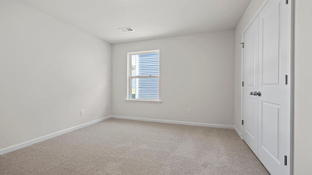 Spacious, unfurnished interior of a new home in Village Grove, Greenville (Image 15).