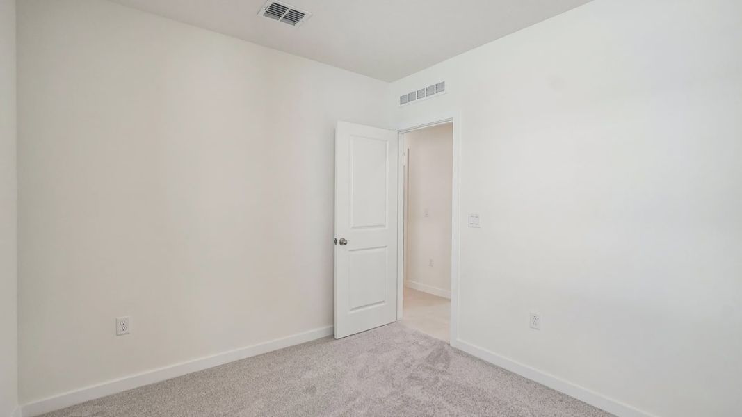 Furnished interior view inside a new home in Willowbrook North, Winter Haven (Image 36).