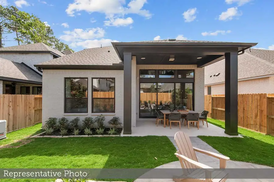 Exterior details and patio area of a home in The Highlands - Grove Collection, Porter (Image 4).