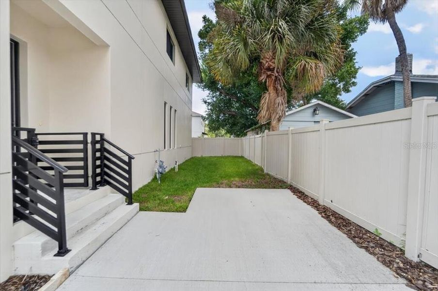 Exterior details and patio area of a home in , Tampa (Image 43).