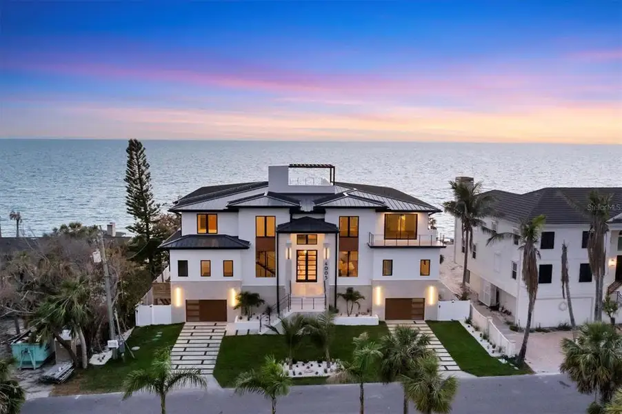 Front exterior of a new home in , Nokomis, FL, highlighting curb appeal (Image 2).