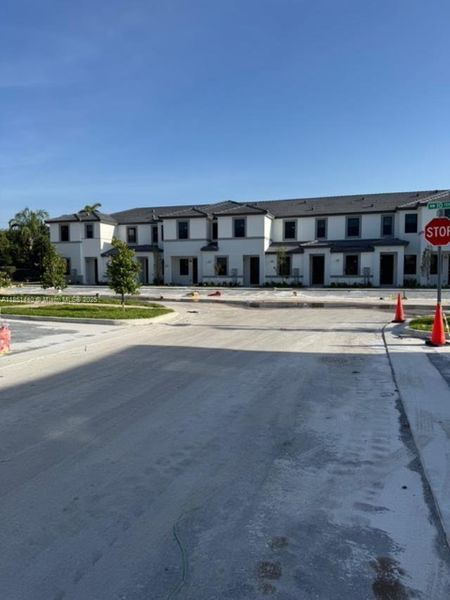 Front exterior of a new home in , Florida City, FL, highlighting curb appeal (Image 18).