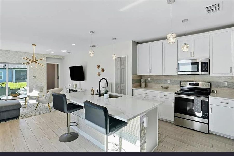 Furnished interior view inside a new home in , Port Charlotte (Image 8). Furnished interior view inside a new home in , Port Charlotte (Image 8).