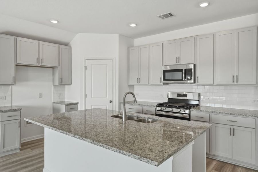 Furnished interior view inside a new home in Longview, Del Valle (Image 6).