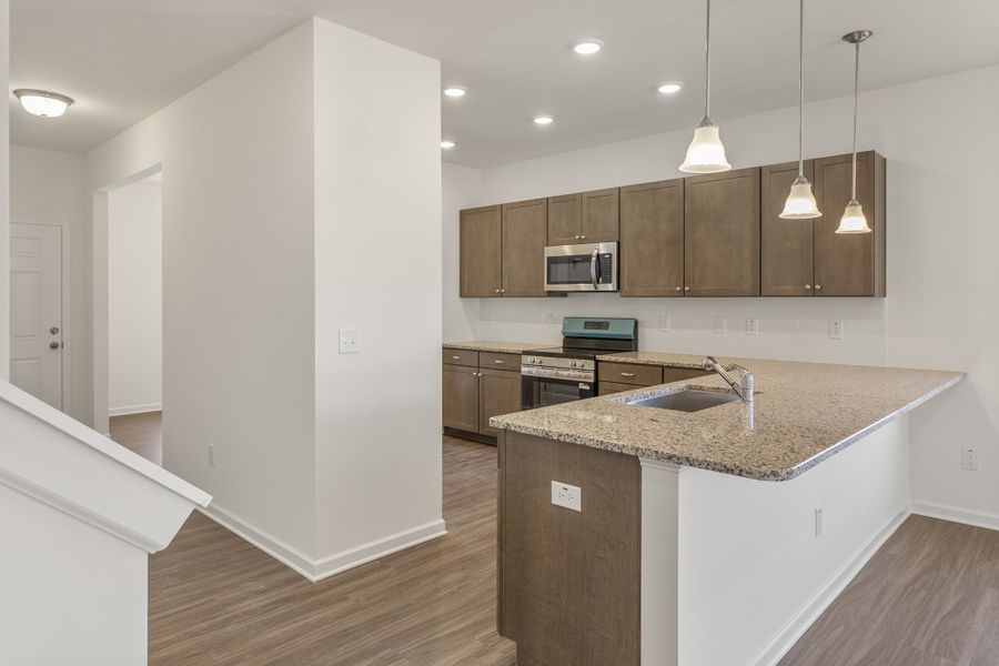 Furnished interior view inside a new home in The Exchange, Vass (Image 8).