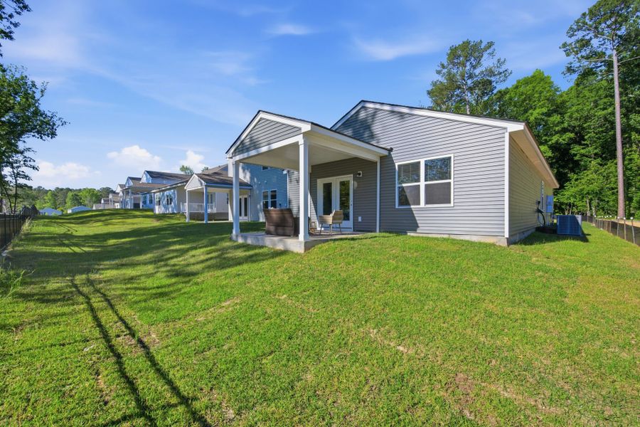 Exterior details and patio area of a home in Grand Arbor, Blythewood (Image 3).