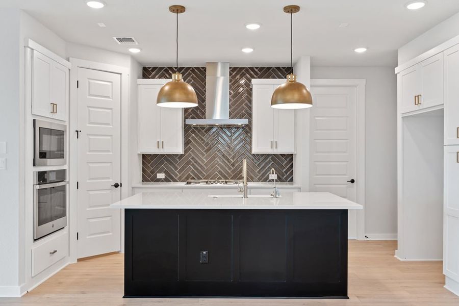 Furnished interior view inside a new home in Terrace Collection at Lariat, Liberty Hill (Image 11). Furnished interior view inside a new home in Terrace Collection at Lariat, Liberty Hill (Image 11).