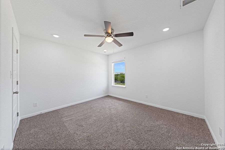 Spacious, unfurnished interior of a new home in The Preserve at Candlemeadow, San Antonio (Image 30).