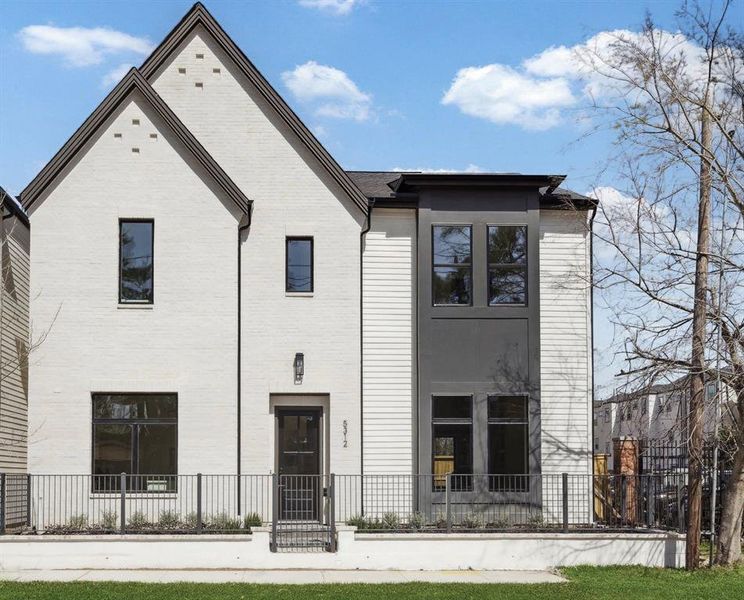 Exceptional Curb Appeal - This home comes with a well-proportioned handsome elevation. Elegant combination of hand slurred brick, painted carriage style garage door with a terracotta paver driveway.