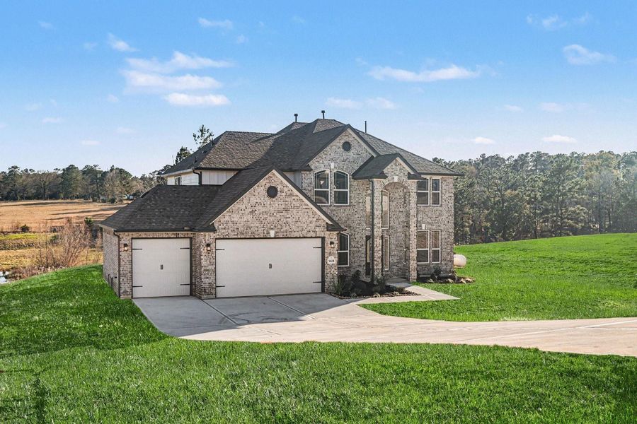 Front exterior of a new home in Rose Hill Estates, Willis, TX, highlighting curb appeal (Image 21).