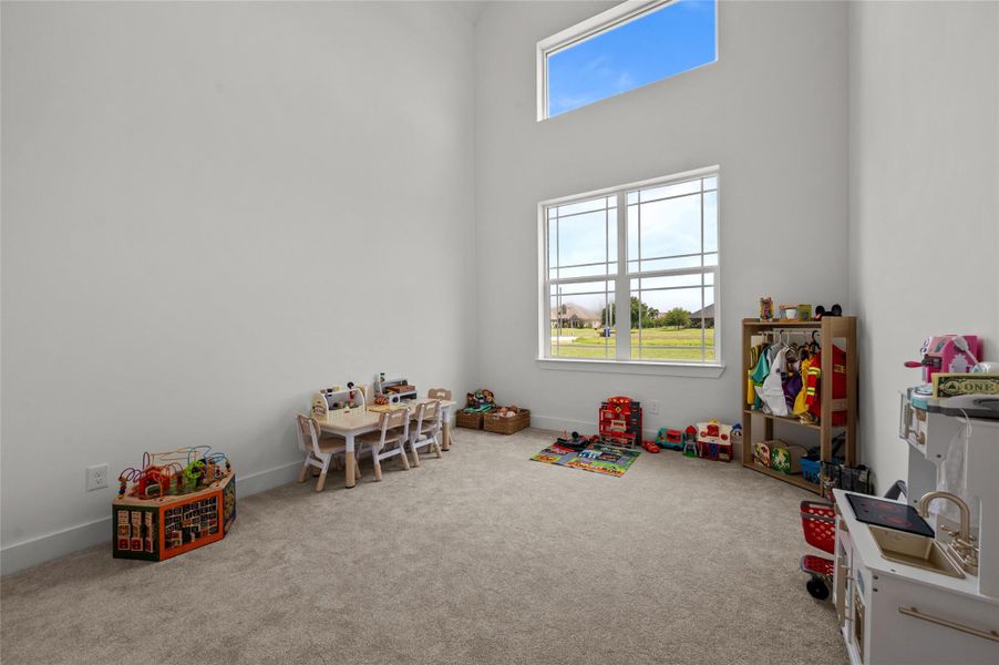 Bedroom #2 with 21ft vaulted ceilings.