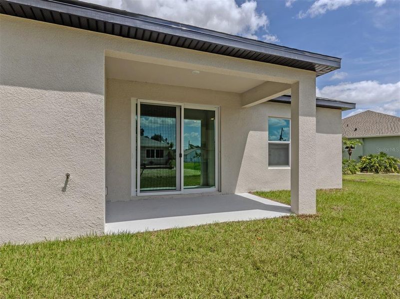 Exterior details and patio area of a home in , North Port (Image 4).