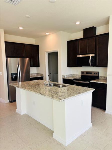 Furnished interior view inside a new home in Eden Hills, Lake Alfred (Image 3).