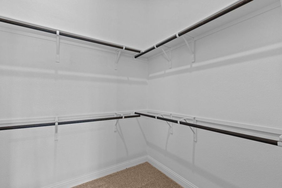 Walk-in closet in Primary Bedroom