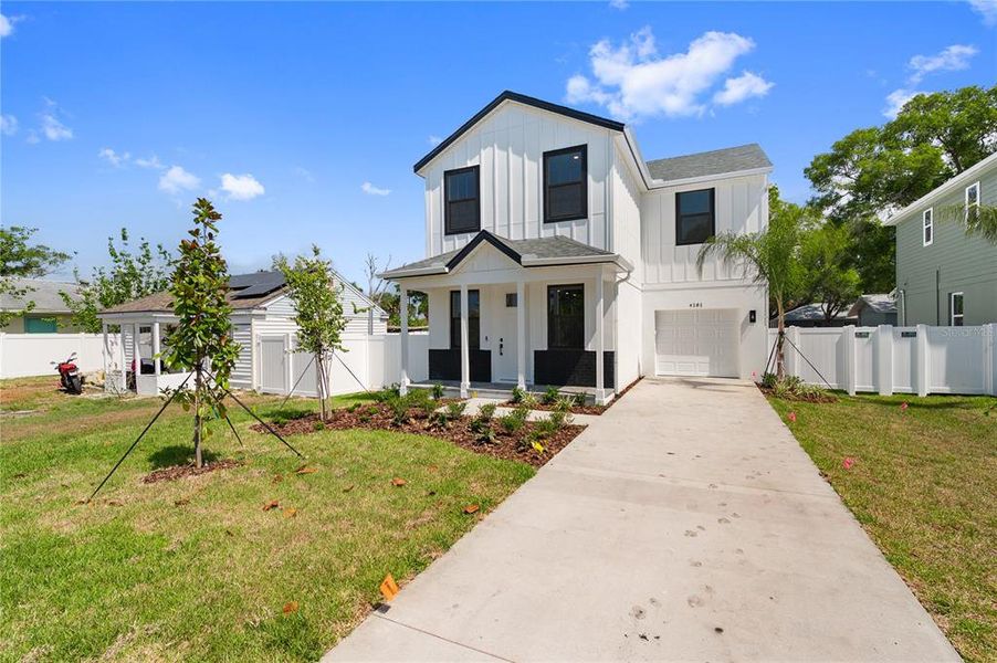Front exterior of a new home in , St. Petersburg, FL, highlighting curb appeal (Image 25). Front exterior of a new home in , St. Petersburg, FL, highlighting curb appeal (Image 25).