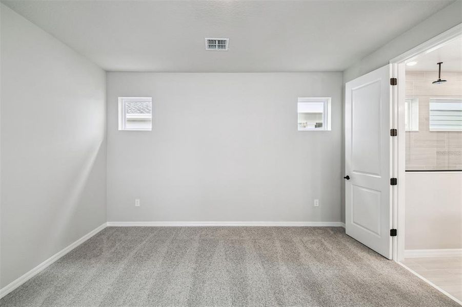 Spacious, unfurnished interior of a new home in Weslyn Park in Sunbridge 34', St. Cloud (Image 50).