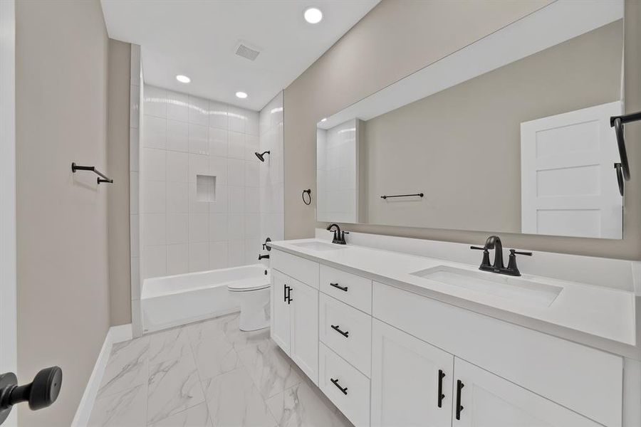 Furnished interior view inside a new home in , The Colony (Image 14).