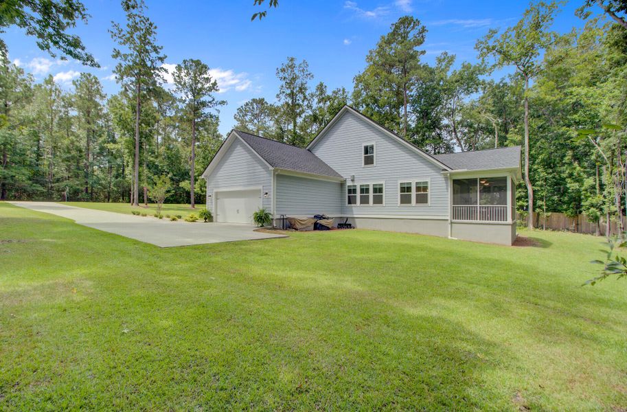 Front exterior of a new home in , Ridgeville, SC, highlighting curb appeal (Image 22). Front exterior of a new home in , Ridgeville, SC, highlighting curb appeal (Image 22).