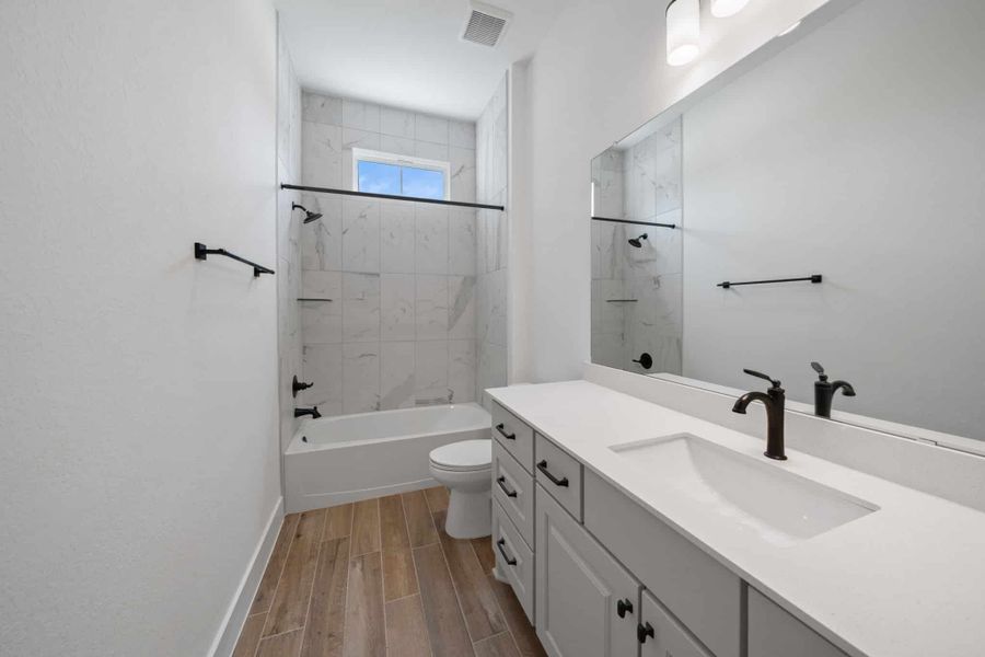 Representative furnished interior of a home built from the Waterloo – 60′ Lot by Chesmar Homes in Lakes of Cane Island, Katy (Image 4).