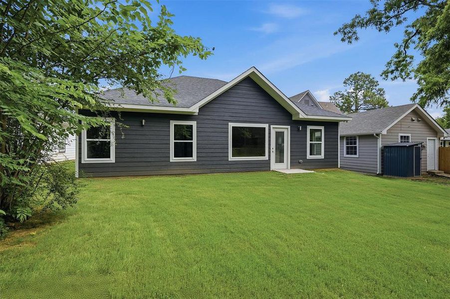 Exterior details and patio area of a home in , Denison (Image 28). Exterior details and patio area of a home in , Denison (Image 28).
