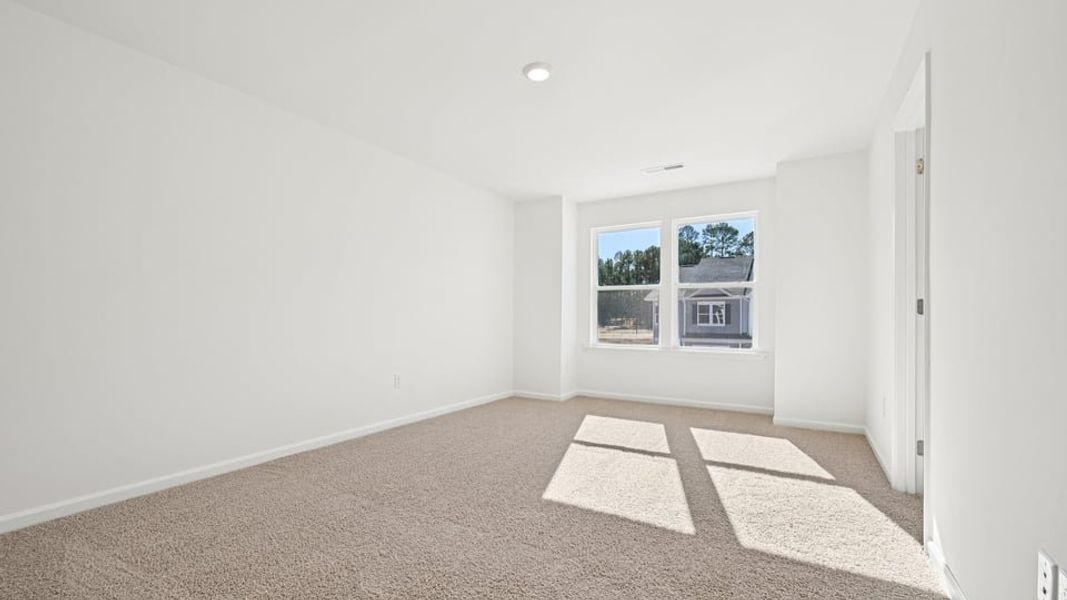 Spacious, unfurnished interior of a new home in Chapel Townes, Raleigh (Image 21).