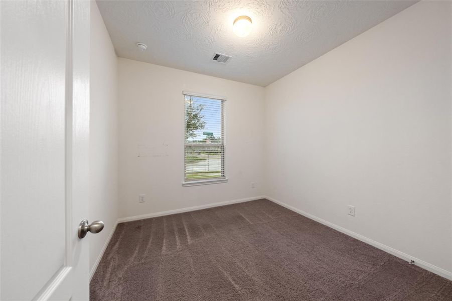 Spacious, unfurnished interior of a new home in Grace Landing, Willis (Image 13).