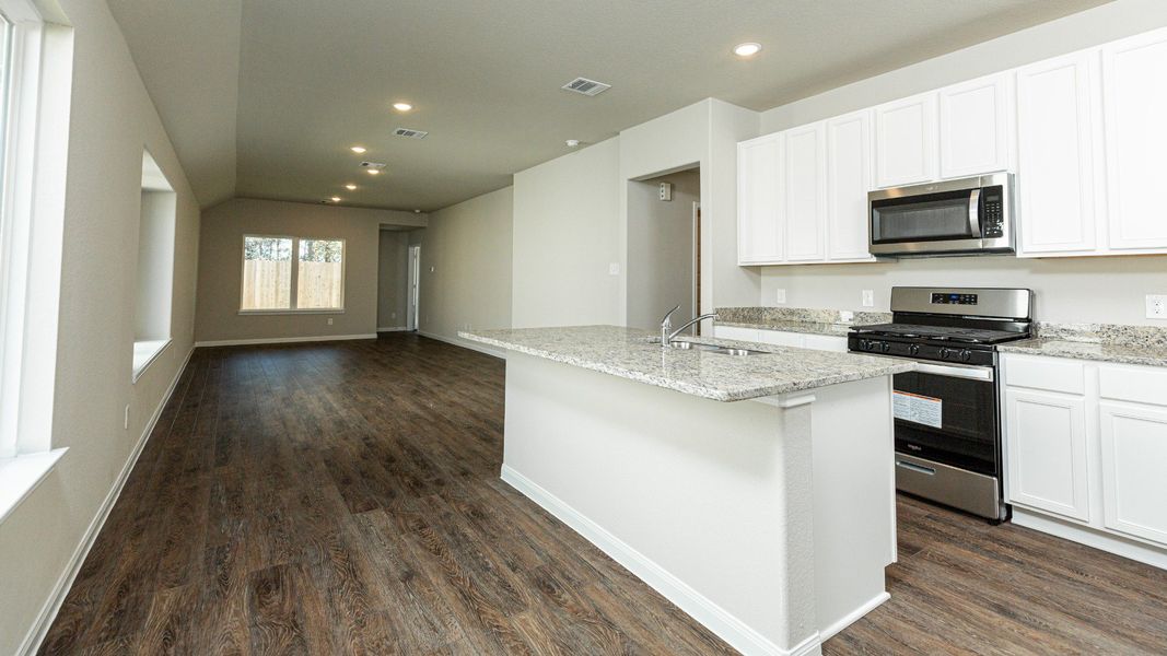 Dining Area to Kitchen and Family Room