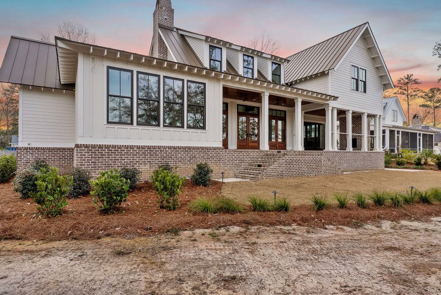 Exterior details and patio area of a home in , Ravenel (Image 4).