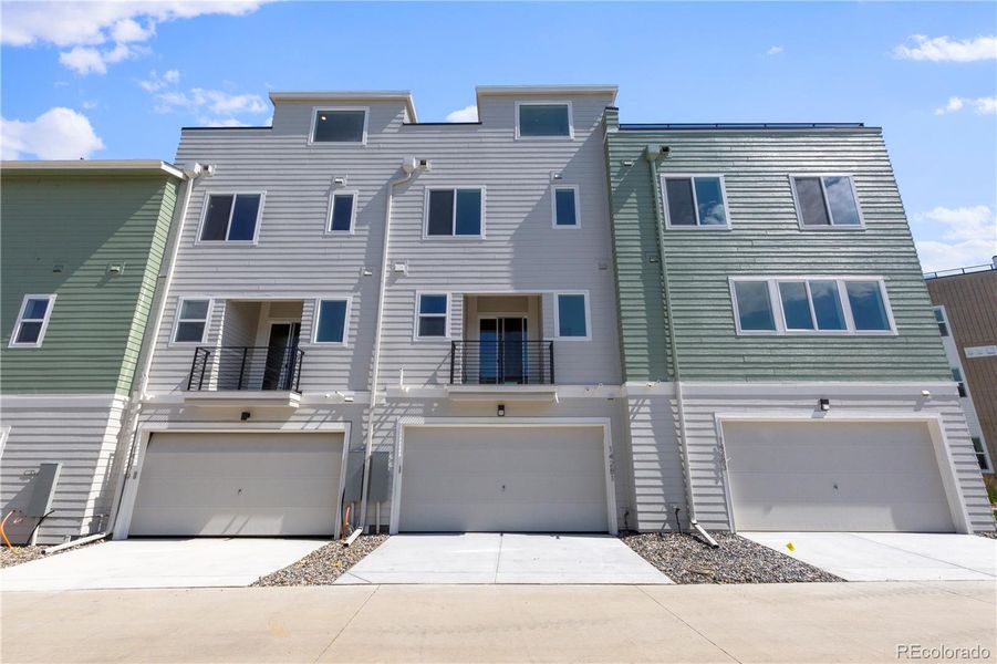 Front exterior of a new home in Dillon Pointe - Skyview, Broomfield, CO, highlighting curb appeal (Image 18).