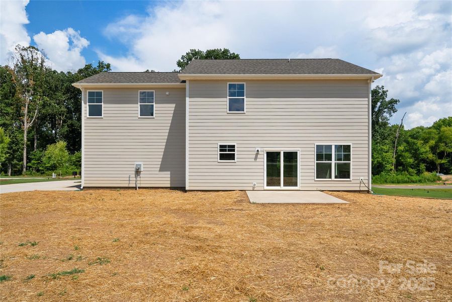 Front exterior of a new home in , Stanfield, NC, highlighting curb appeal (Image 22).