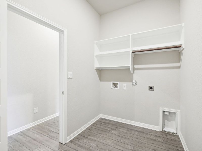 This home's laundry room helps make laundry day a breeze.