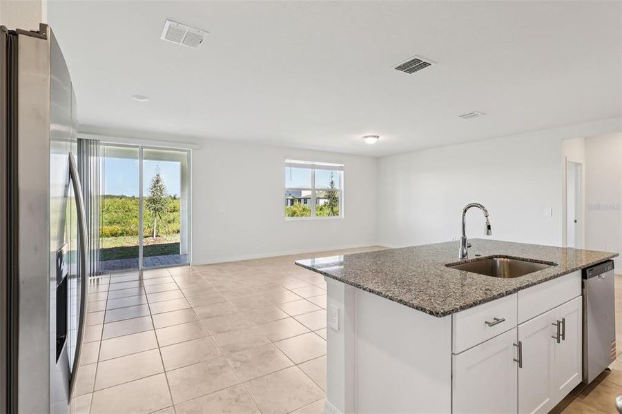 Furnished interior view inside a new home in Lake Deer Estates - Signature Series, Poinciana (Image 4).