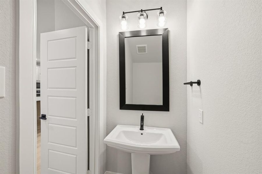 Furnished interior view inside a new home in Karis - Cottage Series, Crowley (Image 11).