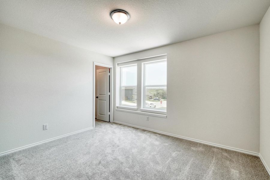 Spacious, unfurnished interior of a new home in Sonterra - Cool Water, Jarrell (Image 20).