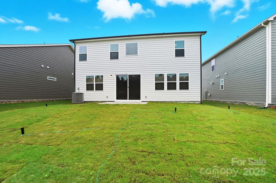 Exterior details and patio area of a home in Waxhaw Landing, Monroe (Image 2). Exterior details and patio area of a home in Waxhaw Landing, Monroe (Image 2).