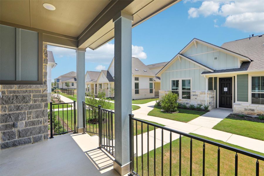 Covered porch with a residential view
