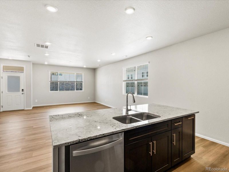 Furnished interior view inside a new home in Skyview at High Point, Aurora (Image 11).