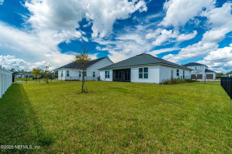 Exterior details and patio area of a home in Courtney Oaks in SilverLeaf, St. Augustine (Image 3). Exterior details and patio area of a home in Courtney Oaks in SilverLeaf, St. Augustine (Image 3).