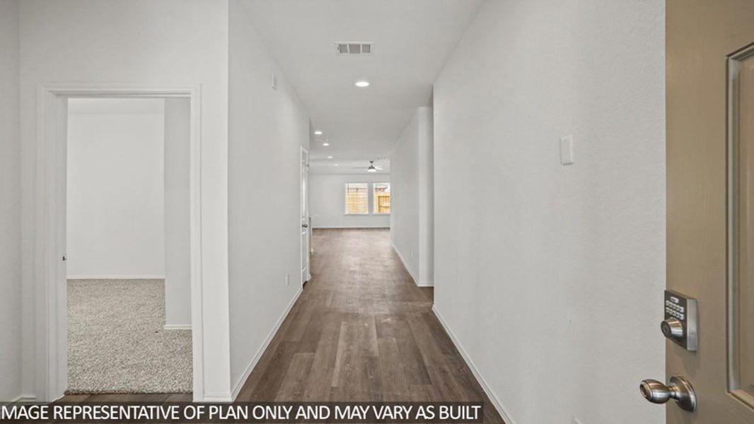 Representative unfurnished interior of a home built from the Glendale by D.R. Horton in Sunterra, Katy (Image 11).