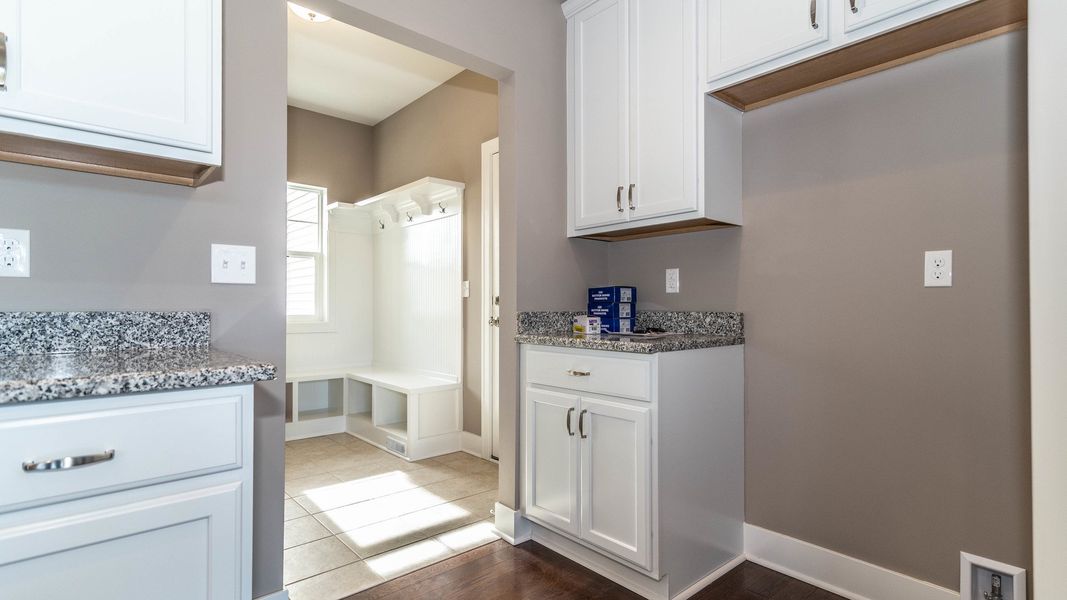 Representative furnished interior of a home built from the The Boulder Side Entry by Norfolk Homes in The Grande Estates, Jackson (Image 10).